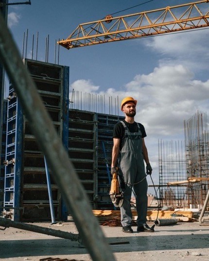 Workers assembling formwork on site